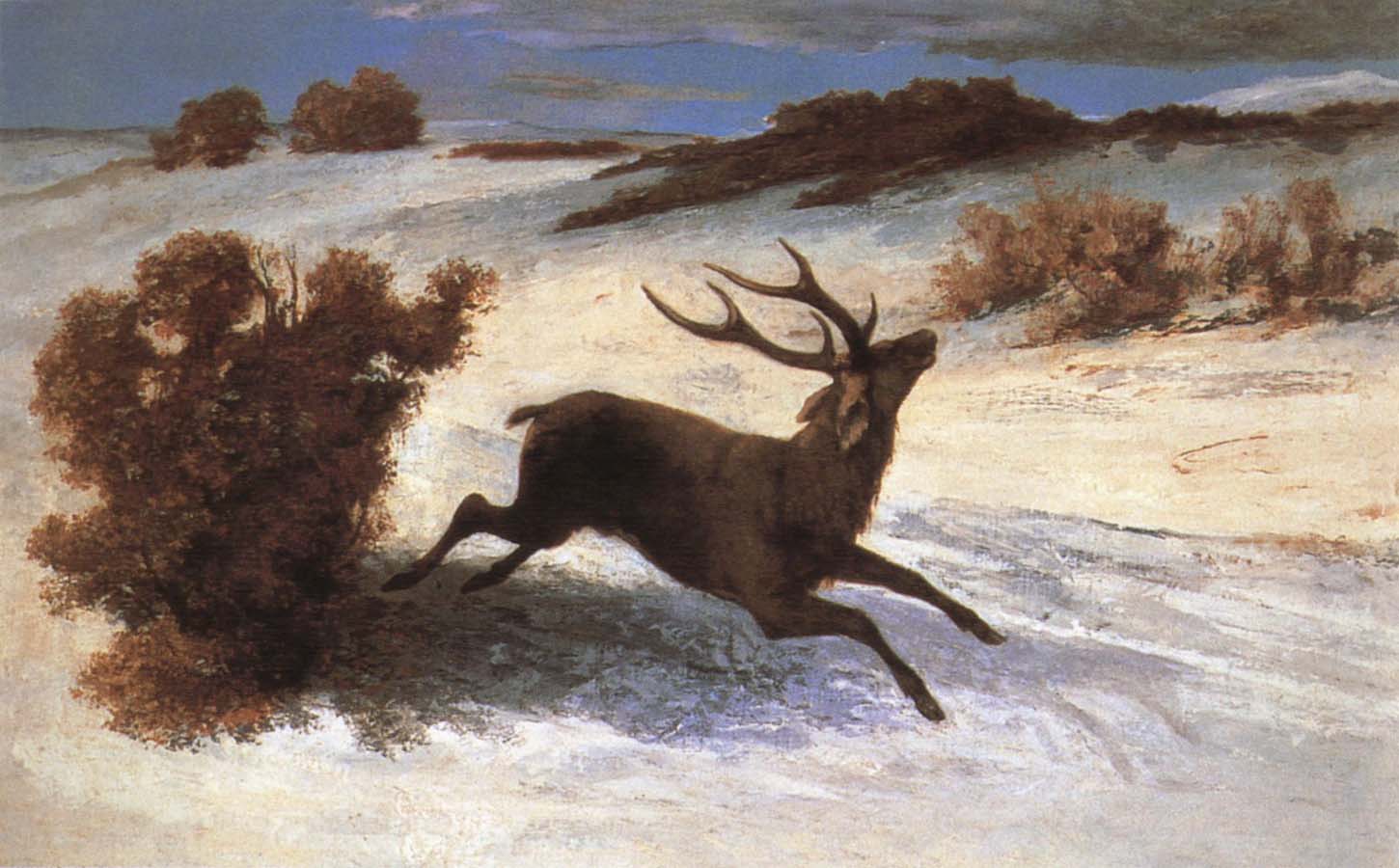 The deer running in the snow